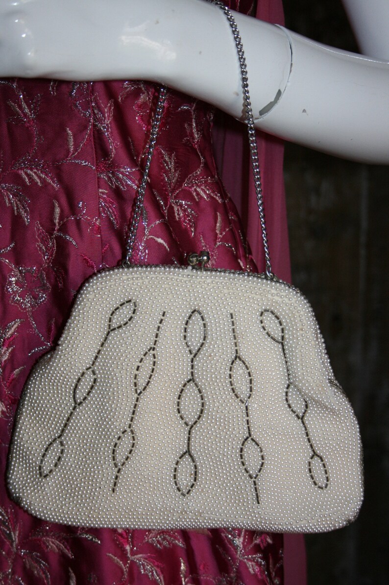 white pearl handle bag