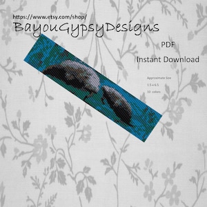 May include: A beading pattern for a bracelet featuring two manatees swimming in blue water. The pattern is 1.5 inches wide and 6.5 inches long and uses 10 colors.