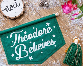 Personalised We Believe. Family Name Believes Glitter Christmas Banner.