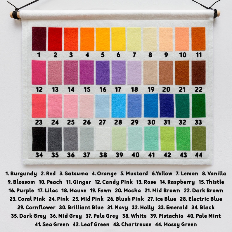 May include: A felt color chart with 44 numbered color swatches, including shades of red, orange, yellow, pink, purple, blue, green, and brown. The chart is labeled with color names like "Burgundy," "Mustard," and "Electric Blue."