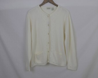 cream cardigan with gold buttons