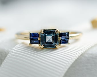 Emerald cut peacock sapphire engagement ring, Yellow gold 14K ring with side baguette sapphires