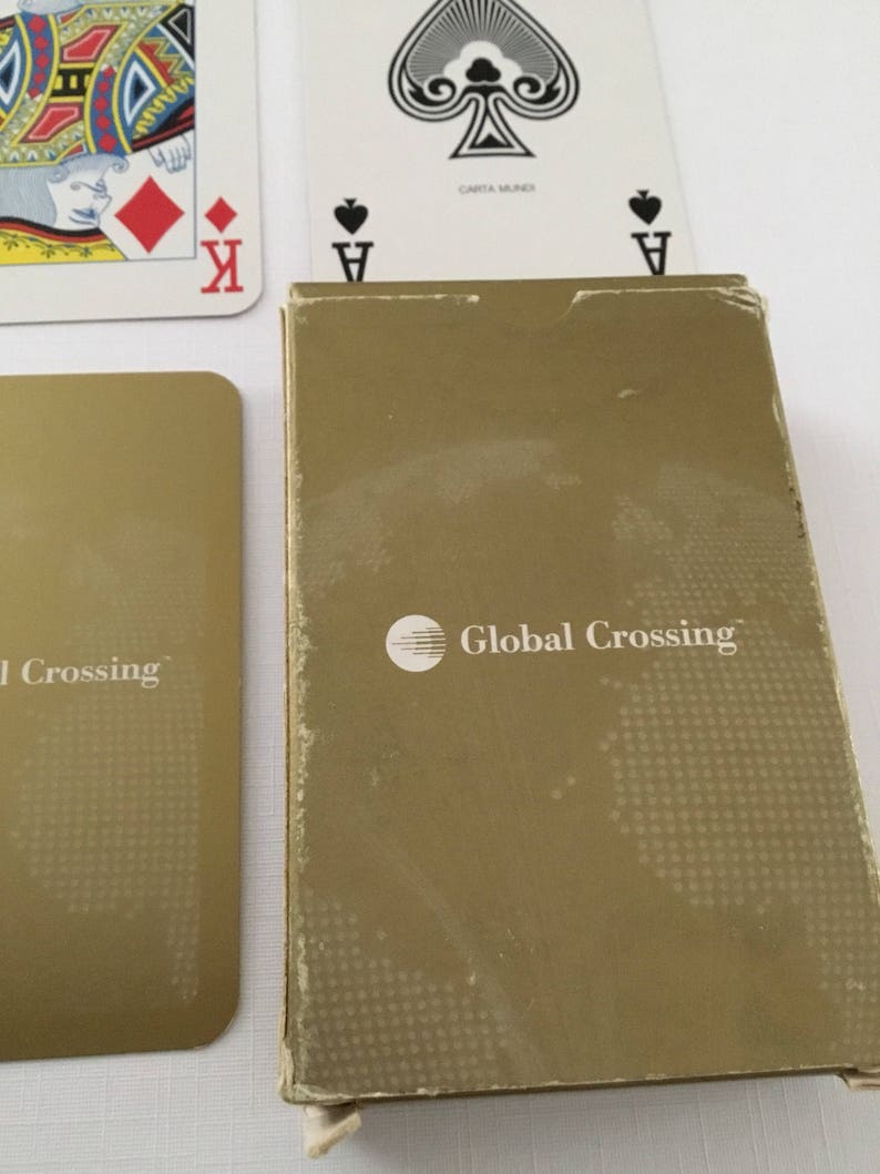 Plastic coated playing cards. Global Crossing Commercial company