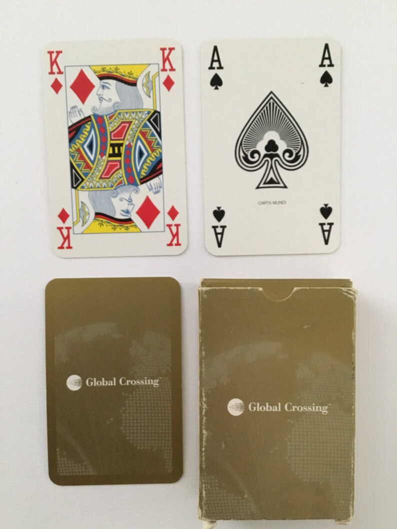 Plastic coated playing cards. Global Crossing Commercial company