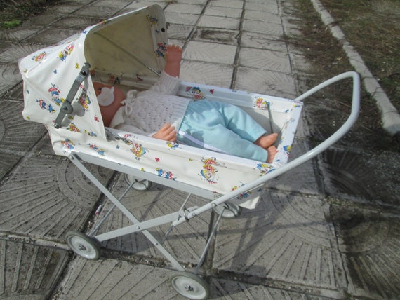 plastic doll pram