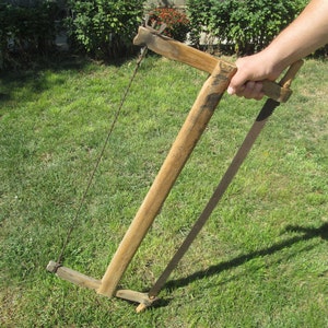 Vintage bucksaw, Old handsaw, Bucksaw with wooden handle, Primitive bucksaw, Wood cutting tool, Rusty cutting tool, Farmhouse decor, Gift