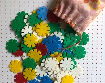 Vintage 1970s Dis-kit plastic interlocking daisy shaped disks