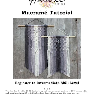 May include: Two macrame wall hangings in a grey and white colour scheme. The hangings are made with a variety of knots and are hung on wooden dowels. The hangings are beginner to intermediate skill level and are 13 1/2 inches wide and 25 to 35 inches long.