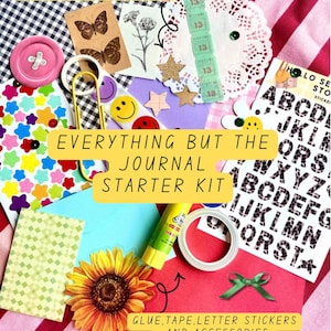 May include: A journal starter kit with washi tape, stickers, and accessories. The kit includes a pink button, butterfly and flower cutouts, smiley face stickers, and letter stickers. The text on the image says "Everything But The Journal Starter Kit."