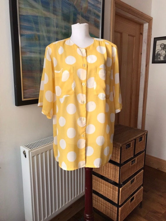 yellow polka dot blouse