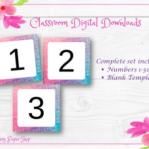Peut inclure: Un ensemble de 31 cartes de nombres de style aquarelle pour une utilisation en classe. Les cartes présentent un fond dégradé rose, violet et bleu. Les nombres 1, 2 et 3 sont affichés sur les cartes. Le texte "Classroom Digital Downloads" et "Complete set includes: Numbers 1-31 Blank Template" est également visible.