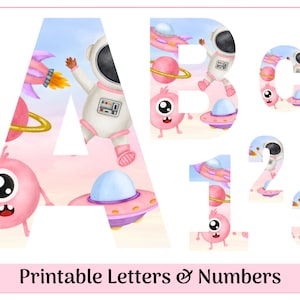 May include: Printable alphabet letters and numbers with a pink and blue space theme. The letters and numbers are cut out and filled with a pattern of pink and blue planets, spaceships, and astronauts.