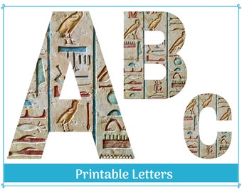 May include: Printable letters A, B, and C with an Egyptian hieroglyphic pattern. The letters are white and the pattern is beige, red, and blue.