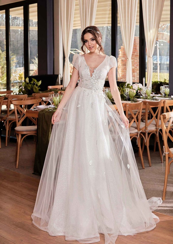 Buy Romantic Bohemian A Line Puffy V Neck Short Sleeve Glitter Tulle  Wedding Dress With 3D Flowers,3d Flowers Glitter Bridal Gown, Glitter Dress  Online in India - Etsy
