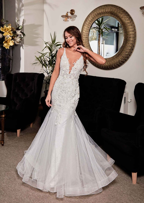 sachin and babi light blue dress A Start-To-Finish Guide to Sensual and Glamorous Wedding Dresses for the Sexy  Bride You Need To Hear About main image 0