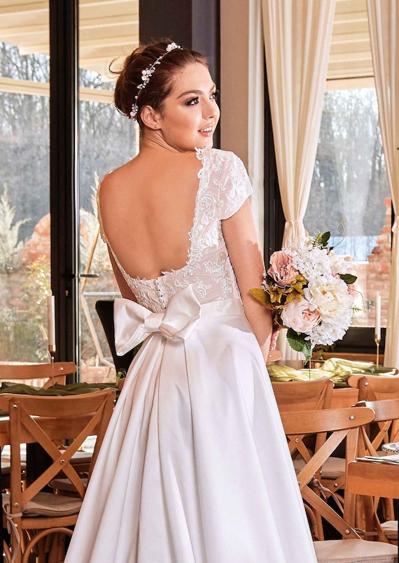 navy blue dress for baby girl The Basque Waist Wedding Dress Trend Cool Brides Love