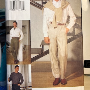 May include: A sewing pattern for men's clothing, Vogue pattern number 8918, size 32-34-36. The pattern includes three different looks: a white shirt with a beige sweater, a striped shirt with jeans, and a white shirt with khaki pants.