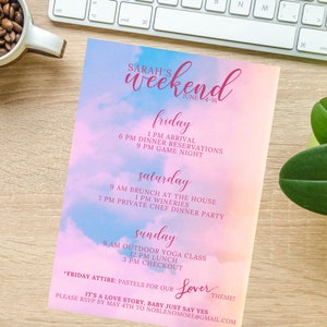 May include: A pastel pink and blue invitation with a cloud background. The invitation is for a weekend event called "Sarah's Weekend" from June 4-16. The invitation lists the schedule for the weekend, including a Friday arrival, Saturday brunch and dinner, and Sunday yoga class and lunch. The invitation also includes the text "It's a love story, baby just say yes!" and a "Lover" theme.