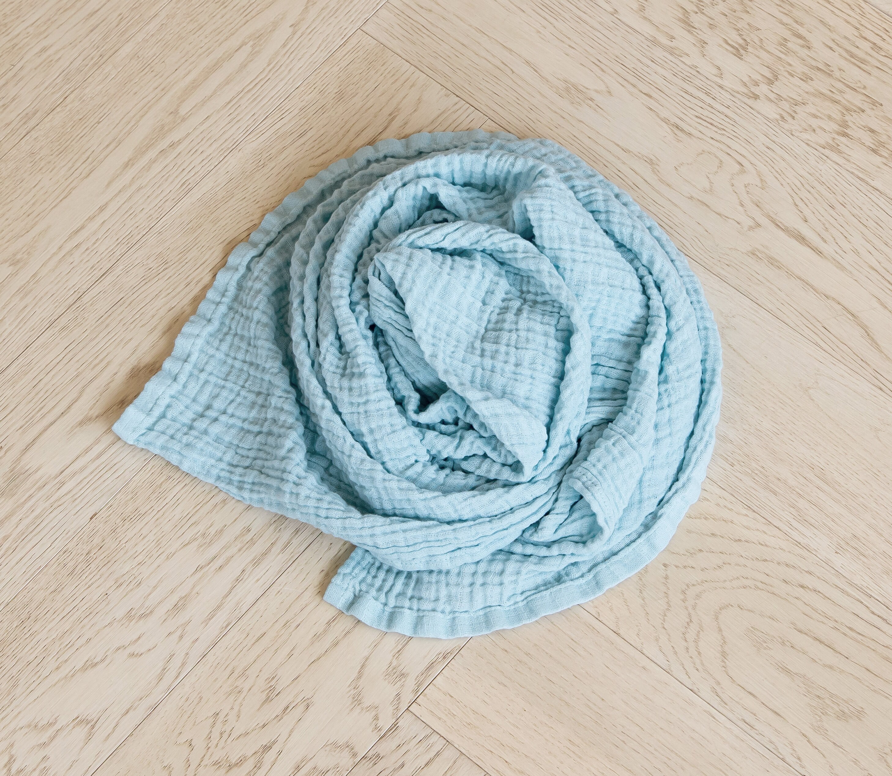 blue muslin swaddle