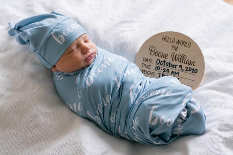 Personalized Baby Swaddle Blanket & optional newborn hat or bow - stretchy jersey with color background and white text 