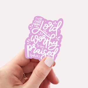 May include: A light purple sticker with white lettering that reads "I will call upon the Lord who is worthy to be praised Psalm 18:3".