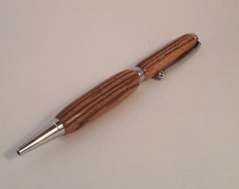 Pluma de giro de madera de cebra