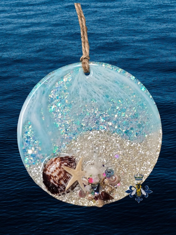 Epoxy Ocean Ornament, shells, glitter, ocean waves, three inches in diameter