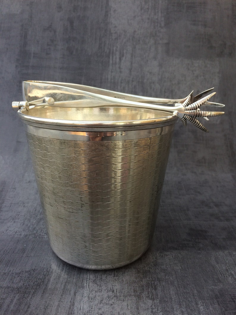 lot 150..very beautiful ENSEMBLE SEAU ice claws and SHAKER. Together bucket has ice and shaker.