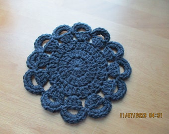 Black crocheted candle mat