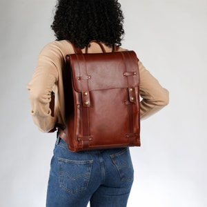 Elevate your adventures with this unique, handmade leather backpack for men and women, perfect for travel.