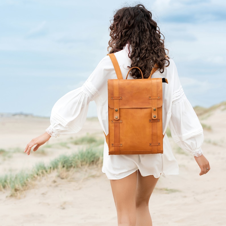 With our leather back pack you can go for a walk or travel.