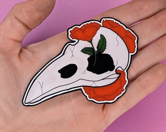 Pegatina floral de calavera de cuervo de 7,6 cm con acabado brillante.