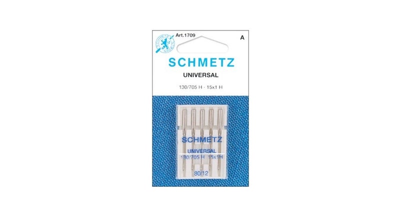 May include: A package of five silver sewing needles in a clear plastic case. The package is labeled "SCHMETZ UNIVERSAL 130/705 H - 15x1 H 80/12".