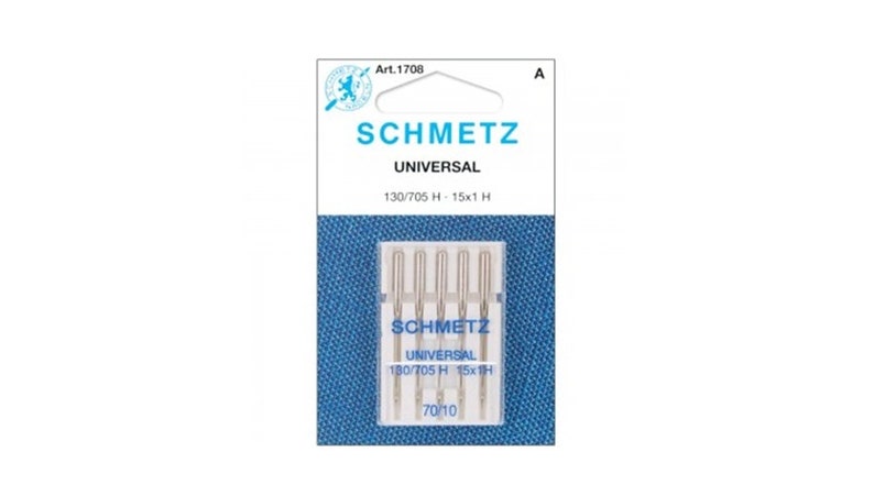 May include: A package of 15 Schmetz Universal sewing machine needles, size 130/705 H, in a clear plastic case with a blue and white label. The label reads "Schmetz Universal 130/705 H - 15x1 H 70/10".