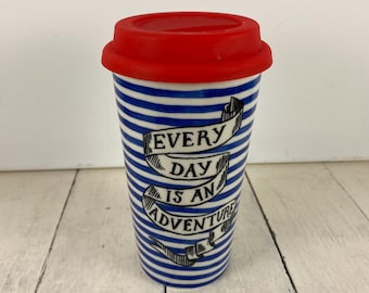 Molly Hatch EVERY DAY is an ADVENTURE 10 oz Travel Coffee Tumbler 6", White with Blue Stripes Black Text Red Silicone Drink-Thru Lid