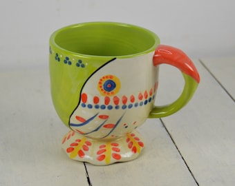 Anthropologie TORTUA 10 oz Mug, Parrot Bird Green with White Coral Beak, Pedestal Mug, 3 7/8"