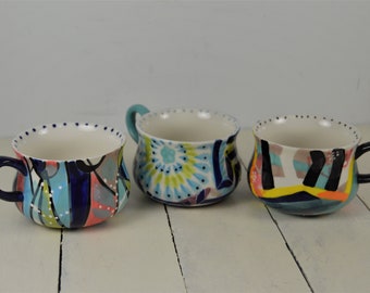 Set of 3 Anthropologie KINETIC STENCIL 10 oz Mugs, 2.5", Abstract Colorful Patterns, Raised Dots, Black Bird Logo