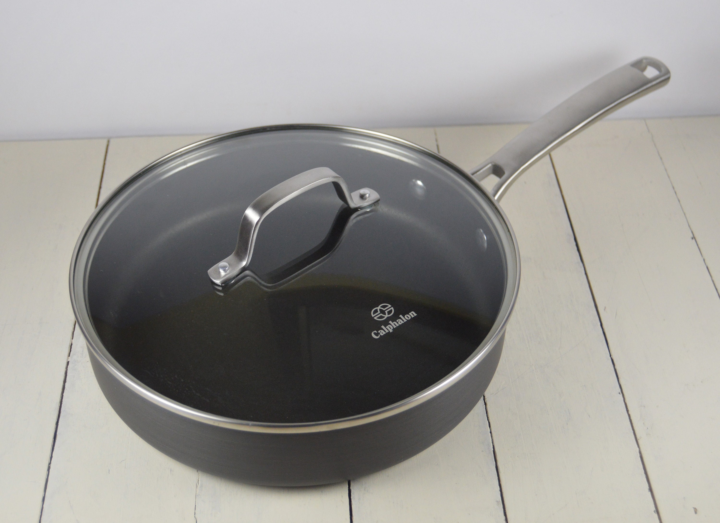  Calphalon Tri-Ply Stainless Steel 1-1/2-Quart Sauce Pan with  Cover: Cookware: Home & Kitchen
