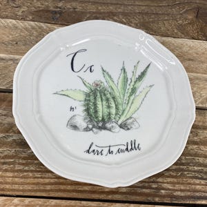 Anthropologie LINEA CARTA Dina Pyari Cc Dare to Cuddle 6 3/8" Plate, Cactus Plants Letter Plate, C is for Cactus, Off-White, Scalloped