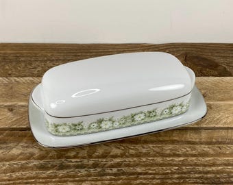 Noritake PRINCETON 1/4 lb Covered Butter Dish, White with Silver Trim White Flowers Green Leaves Border, Handles, Japan