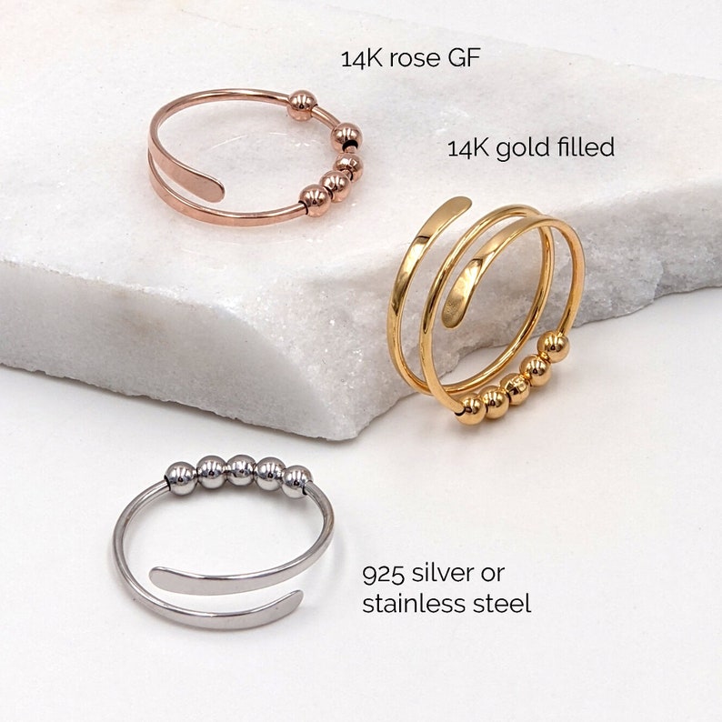 Single and ppiral fidget ring with 5 round beads and hammered ends; in sterling silver gold filled and rose gold filled
