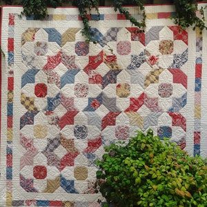 Tiptoe quilt,  Layer Cake friendly.  Easy piecing.  Suitable for a confident beginner.