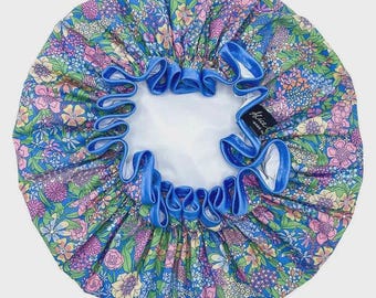 Liberty Tana Lawn Shower Cap. Pretty and practical with a waterproof lining and satin ribbon trim. Made in England in a range of prints.