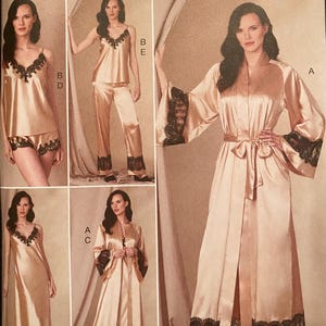 May include: Vogue Patterns sewing pattern featuring a variety of lingerie designs. The designs include a satin robe with lace trim, a camisole and shorts set, a camisole and pants set, and a long satin nightgown. The pattern size is B5 (8-10-12-14-16).