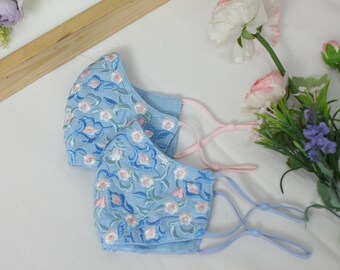 Geborduurd linnen gezichtsmasker: herbruikbaar stoffen masker met bloemen
