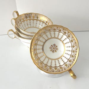 Teacup and saucer ,gold star center with gold handles,Large size with oversized saucer, Fine China, Made England ,Vintage Maximalism,Cauldon