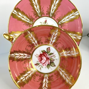 Vintage Paragon Pink Teacup and Saucer: Gold Feather Design, Royal Warrant