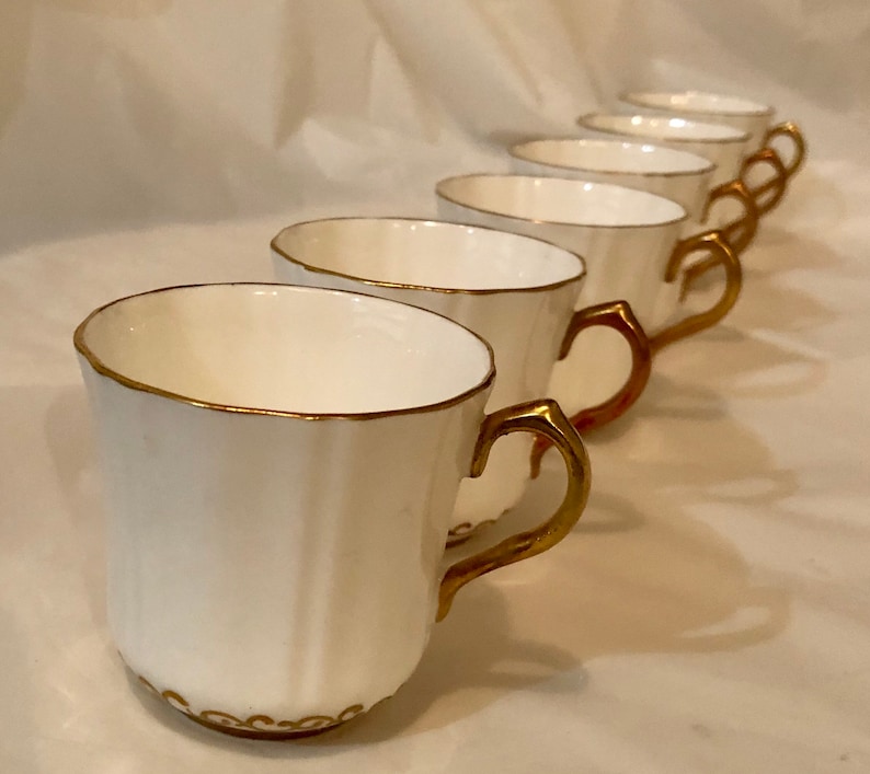 Teacup and Saucers , Demi tasse / Espresso / Coffee cups , Vintage , White and Gold,fine bone china, Six cups and Five saucers, reusable image 1