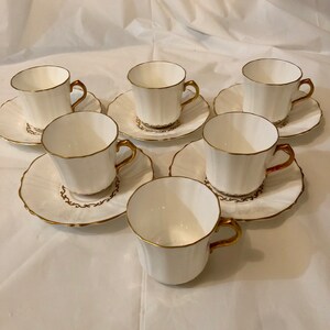Teacup and Saucers , Demi tasse / Espresso / Coffee cups , Vintage , White and Gold,fine bone china, Six cups and Five saucers, reusable image 6
