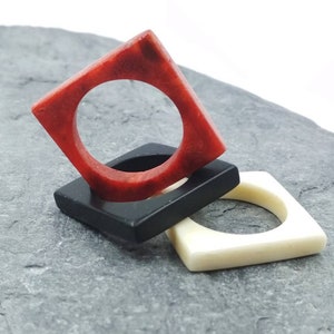 Triple stackable ring in bone, coral, ebony wood
